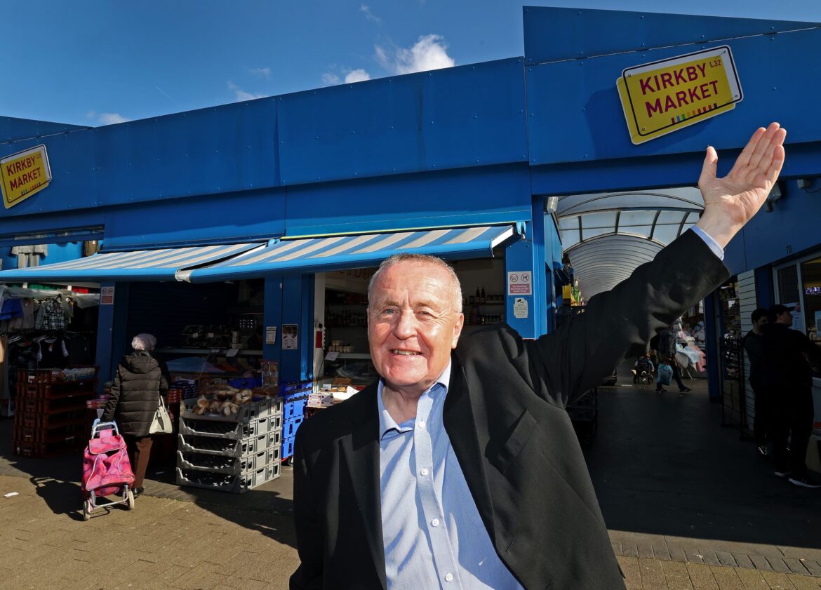 Cllr Brennan outside newly refurbished Kirkby Market
