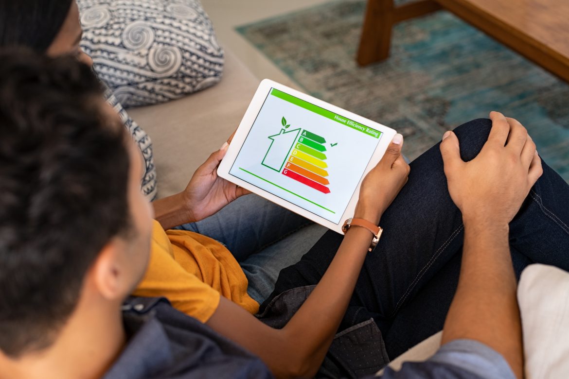 man looking at energy efficiency information on tablet