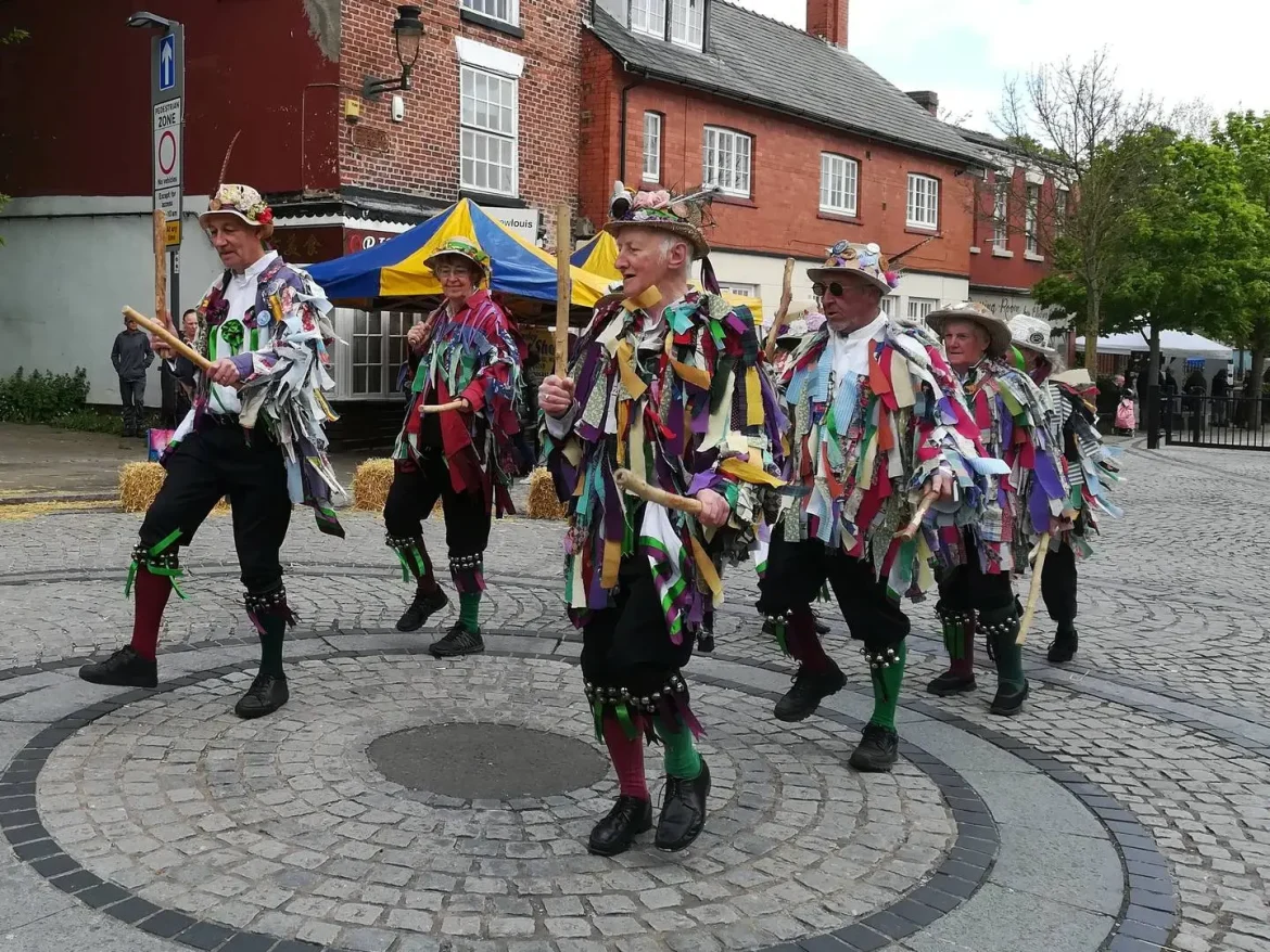 Mucky Mountains Morris dancers perform in Prescot in 2019
