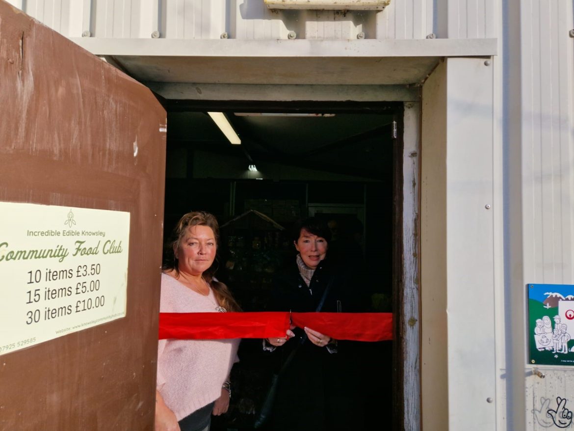 Incredible Edible's CEO Karen Mower stands with Cllr Christine Bannon as she cuts a ribbon to officially re-open the food club