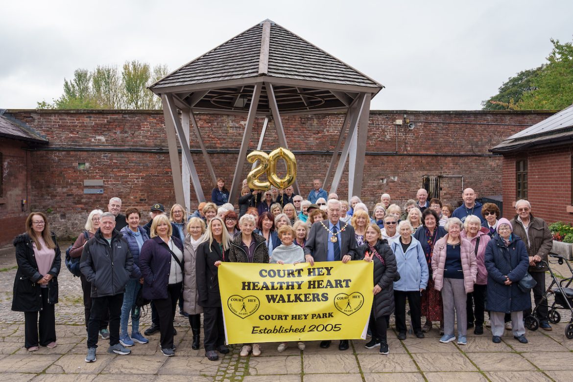 group of people with banner