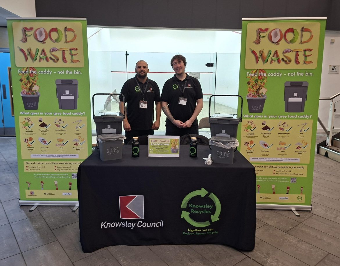 staff with food waste information